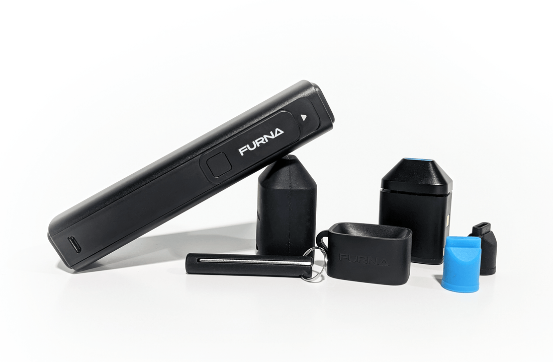 A Furna vaporizer with two ovens, and loading accessories.