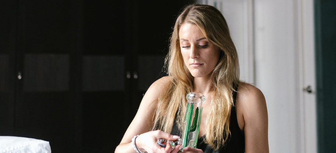 A person using a bong.